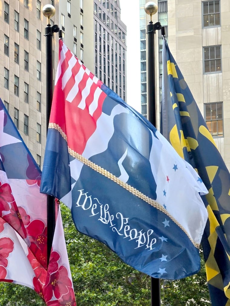Jeweler Steven Lagos' flag is among the 120 custom made flags from national and international designers celebrating America's 250th birthday in Rockefeller Center.