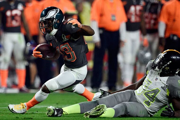 Team Irvin return specialist Darren Sproles of the Philadelphia Eagles (43) runs the ball past Team Carter linebacker Lawrence Timmons of the Pittsburgh Steelers (94) in the 2015 Pro Bowl at University of Phoenix Stadium. (Kyle Terada/USA TODAY Sports)