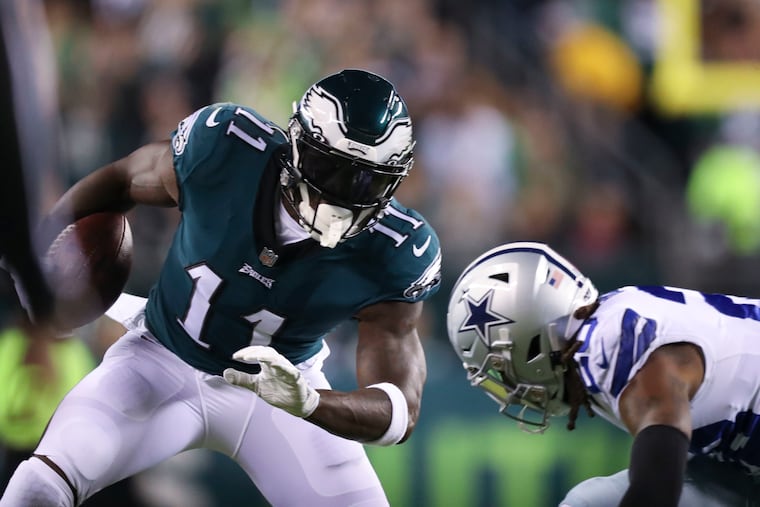 Philadelphia Eagles wide receiver A.J. Brown (11) picks up the first down during the first quarter against the Dallas Cowboys at Lincoln Financial Field in Philadelphia, Pa. on Sunday, October 16, 2022.