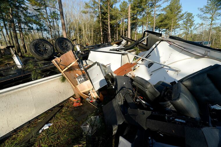 Furniture and kitchen appliances are exposed Sunday in the remnants of a recreational vehicle damaged by a series of storms that passed through Paradise Ranch RV Resort in Tylertown, Miss.