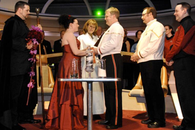 The happy Class M planet couple, Kate Erwin and Brad Siegel, who met at a Trekkie convention, were joined in holy and Federation-approved matrimony last night as winners of the Franklin Institute's Star Trek Exhibition Wedding Competition. (Alyssa Cwanger / Staff)