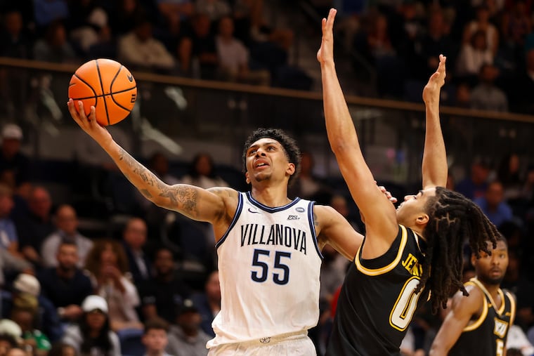 Villanova guard Acaden Lewis goes to the hoop past VCU's Brandon Jennings during the exhibition game on Sunday.