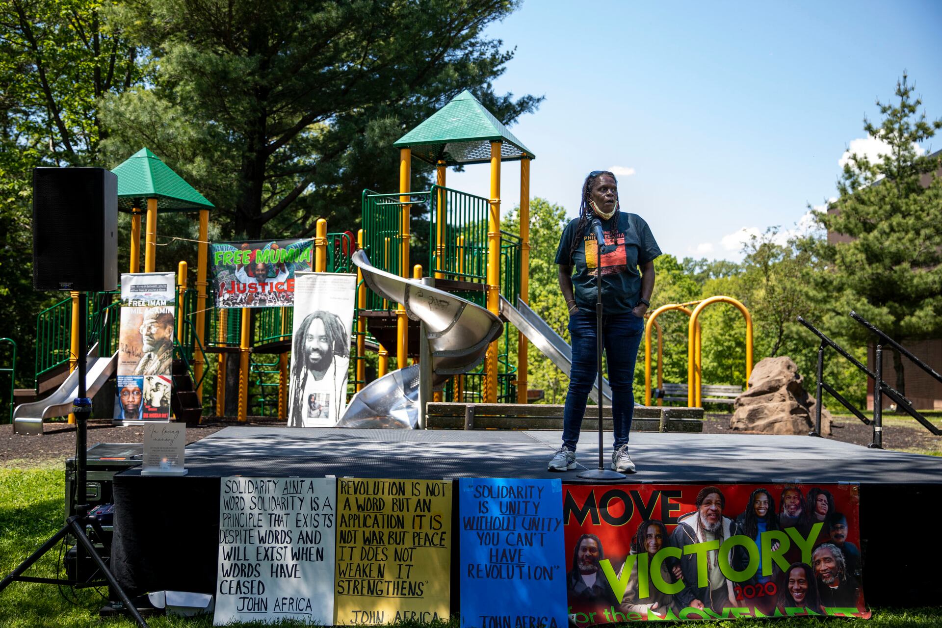 Consuewella Africa, 69, speaks during the gathering for the 36th anniversary of the MOVE bombing at Cobbs Creek Recreation Center on May 15, 2021. Consuewella lost her two daughters, Katricia, 14, and Zanetta, 12, in the bombing.