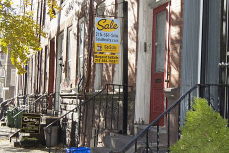 Triplex listed for $325,000, 15th and Tasker Streets.