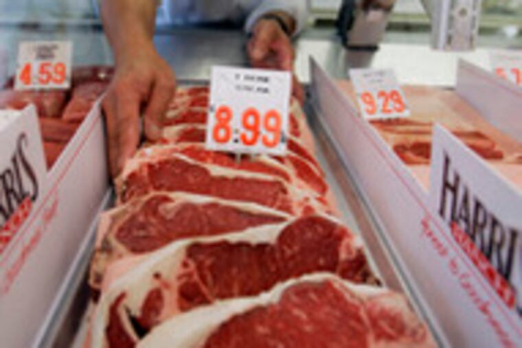 Steaks at a butcher in Pacifica, Calif. Demand for meat remains steady, so costs can be passed on.