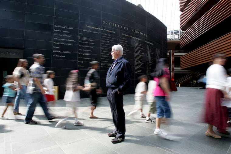 Philly Pops conductor Peter Nero watches as the crowds enter the Kimmel Center for a performance. (David Swanson/Inquirer)