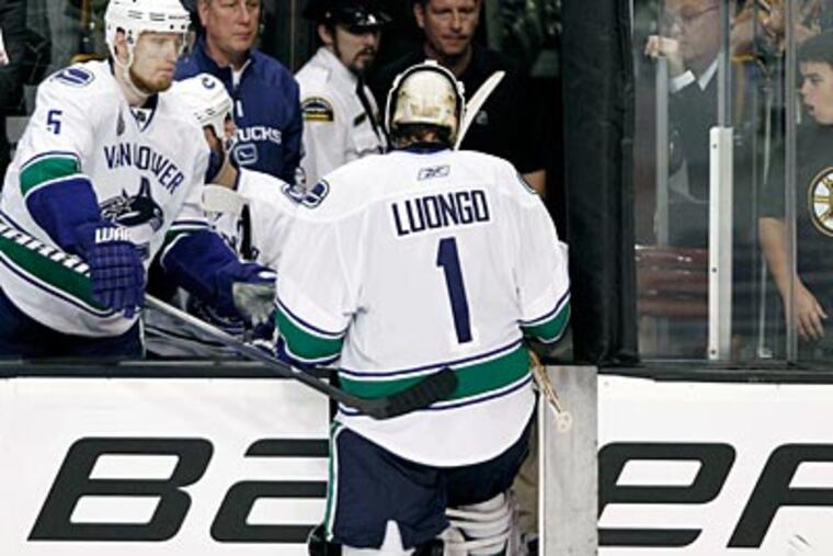Roberto Luongo and the Canucks have lost two straight to the Bruins in the Stanley Cup Finals. (Winslow Townson/AP)
