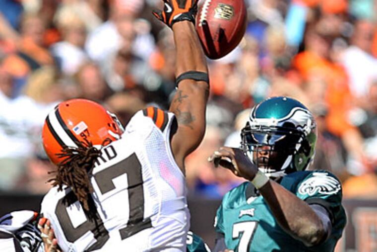 Michael Vick threw 56 passes in the Eagles' win over the Browns. (Ron Cortes/Staff Photographer)