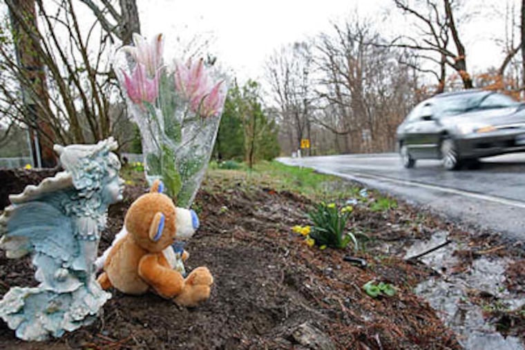 A memorial along Creek Road (above) marks the spot where Nicolette Pomon (left) and her unborn child died Tuesday.