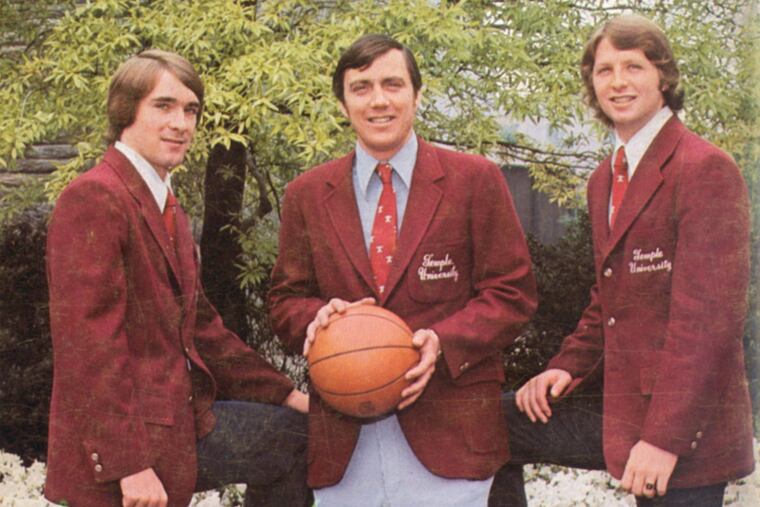 Temple head coach Don Casey is flanked by 1973 co-captains Rick Trudeau (left) and John Knelb.