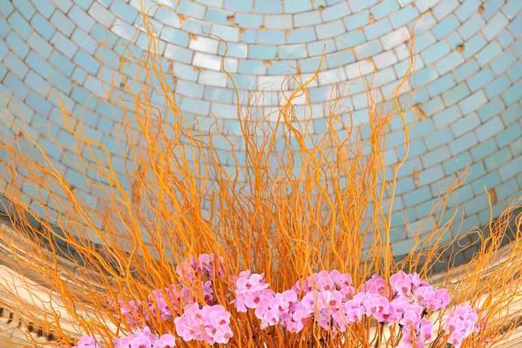 The top of the Olmsted Pavilion, designed by Valley Forge Flowers, at FDR Park for the 2022 Philadelphia Flower Show.