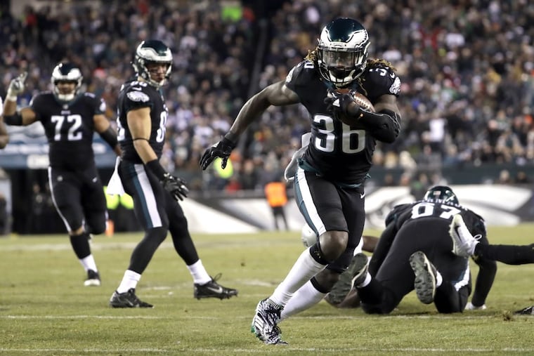 Philadelphia Eagles' Jay Ajayi (36) runs for a touchdown during the first half of an NFL football game against the Oakland Raiders, Monday, Dec. 25, 2017, in Philadelphia. (AP Photo/Michael Perez)