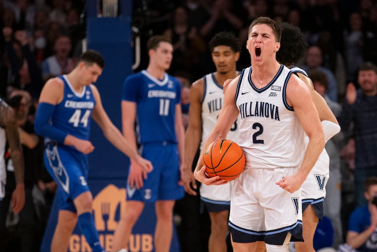 Collin Gillespie of Villanova celebrates late in their victory over Creighton in the Big East Tournament Championship on March 12, 2022 at Madison Square Garden in New York City.