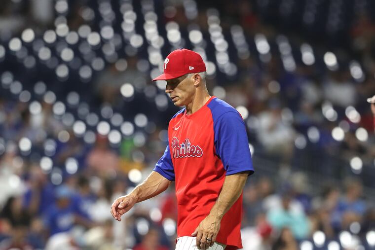 Phillies manager Joe Girardi stuck with Zack Wheeler too long Wednesday night.
