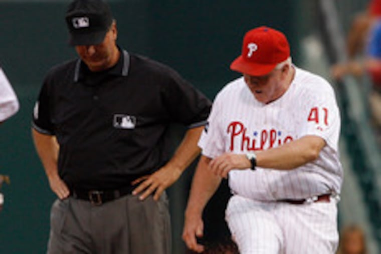 Phillies manager Charlie Manuel reacts after being ejected by first base umpire Tim McClelland in the second inning for arguing the call on a bunt attempt by Giants pitcher Matt Morris. Morris took a no-hitter into the sixth last night.