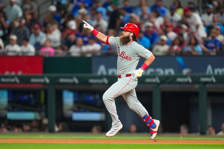 Philadelphia Phillies' Brandon Marsh hit a solo home run off Texas Rangers pitcher Merrill Kelly during the fourth inning.