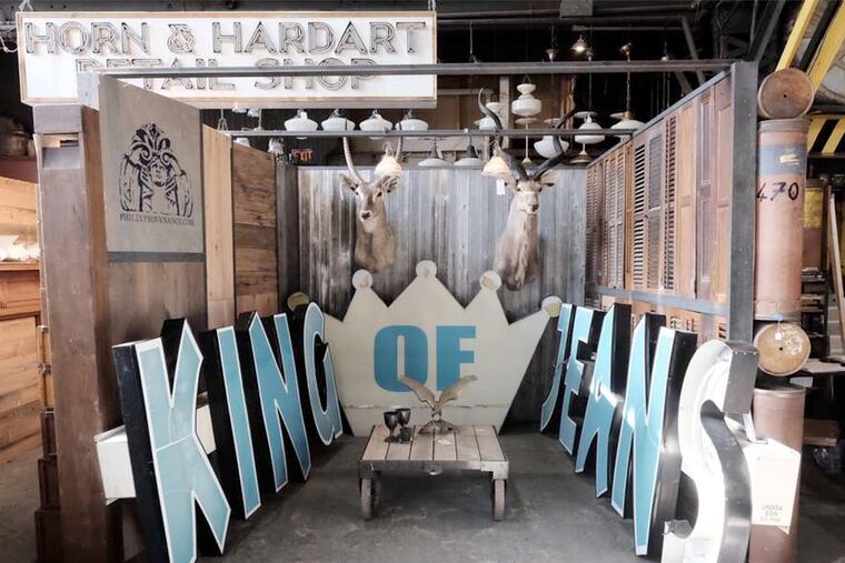 The King of Jeans sign, formerly of East Passyunk Avenue, now lives at Provenance Companies in Northern Liberties.