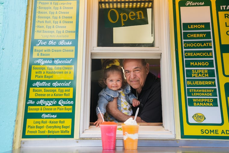 Joe Stranieri and his grandaughter Vada in the window at Rose's Real Italian Water Ice in Roxborough, in Philadelphia, April 20, 2026.