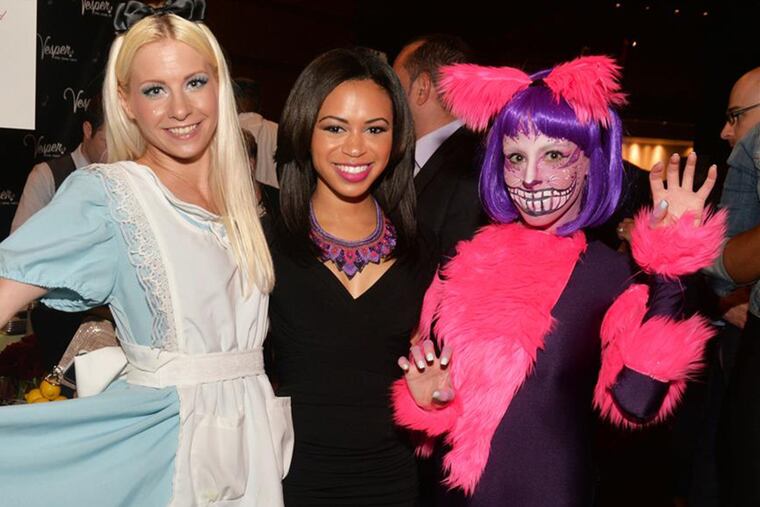 Alex Holley of Fox29 with "Alice in Wonderland" character at Philly Style's "Best of Style" event at the Kimmel Center.