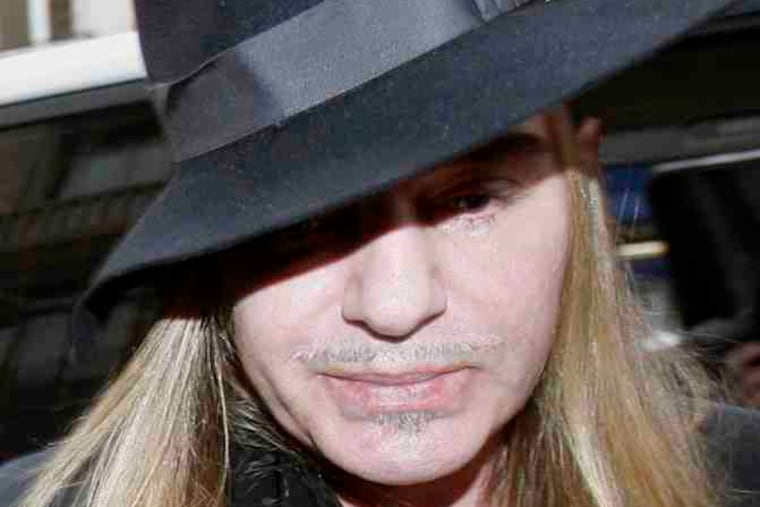 Dior designer John Galliano has been arrested for an alleged anti-Semitic rant, and Natalie Portman says she "will not be associated" with him. (See "Haute couture to Heil couture.")