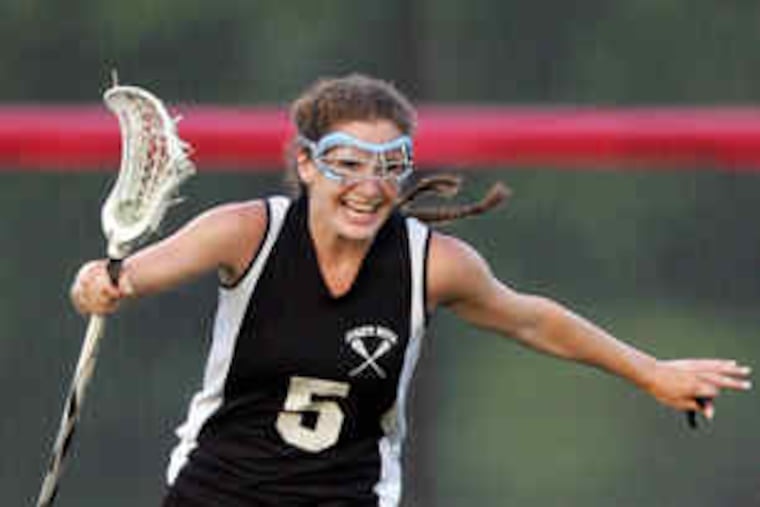 Emily Garrity celebrates one of her seven goals in the triumph over Unionville. She became just the third high school girl to score 400 career goals.