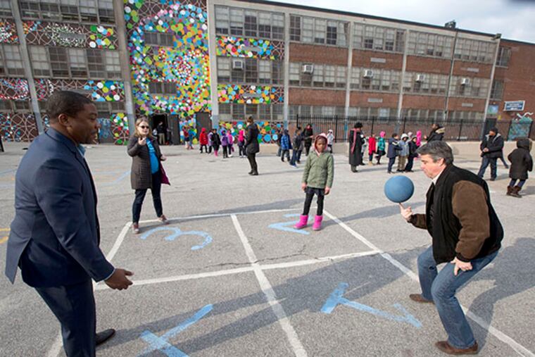 Councilman Bobby Henon plays four square with Rodney Oglesby, Jeanette Fournier and third-grader Eniyah Tillman at McMichael Elementary School in West Philadelphia on Friday, January 16, 2015. ( DAVID SWANSON / Staff Photographer )
