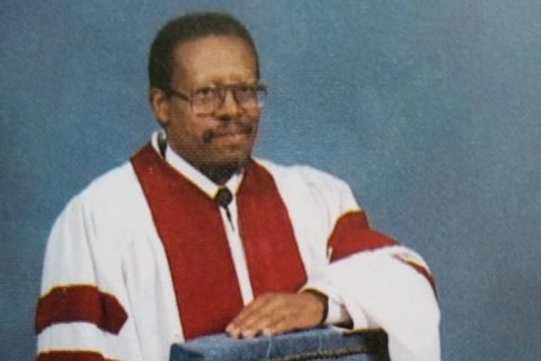 Rev. Thompson, here in his communion robe, ministered to congregants for decades and taught philosophy and theology at East Stroudsburg University for 35 years.