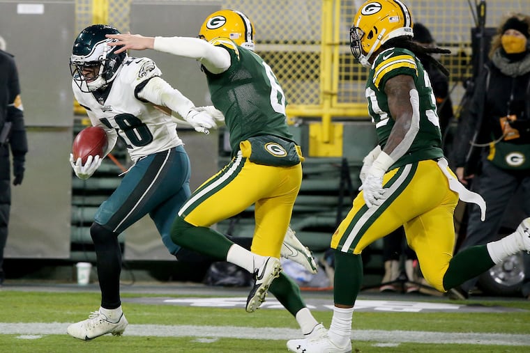 Jalen Reagor, left, had his best game of the season, with highlight plays including a 73-yard punt return for a touchdown.