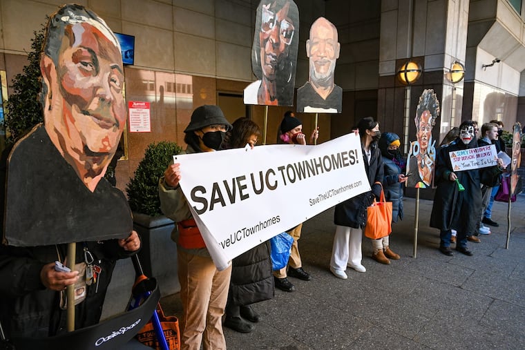 Save UC Townhomes protesters gather outside Marriott Hotel Center City on Wednesday. The group demanded the city assist in its fight to preserve the 69-unit federally subsidized housing complex in West Philadelphia that's planned to be demolished and sold by its owners.