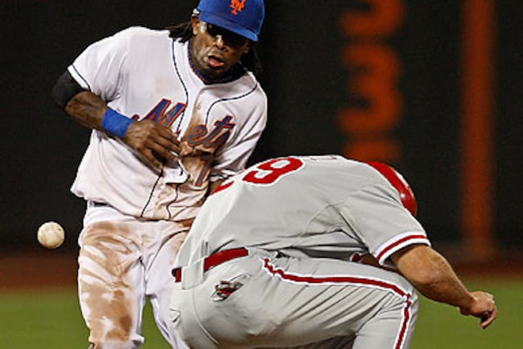 "We're getting outplayed," Charlie Manuel said. "We're getting
outhustled." (Kathy Willens/AP)