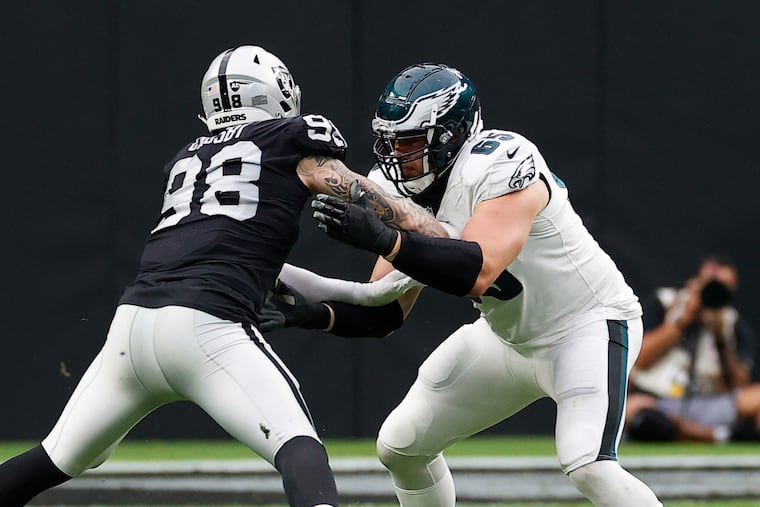 Eagles offensive tackle Lane Johnson blocks Las Vegas Raiders defensive end Maxx Crosby during a matchup on Oct. 24, 2021 in Las Vegas.