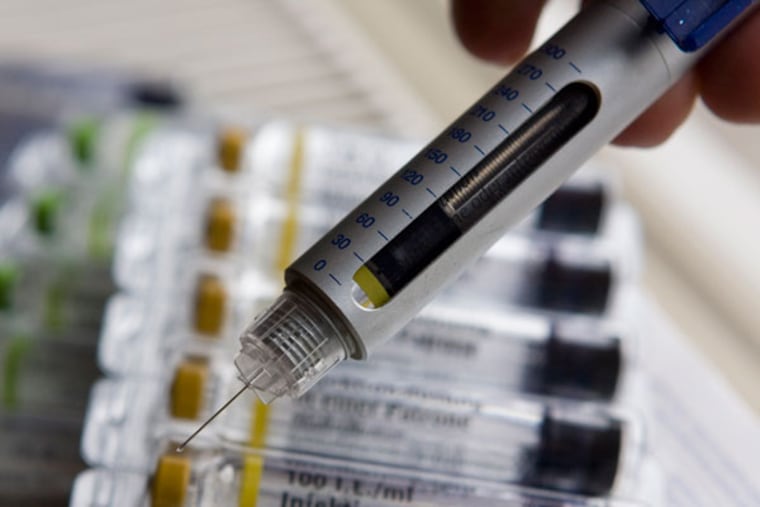 An insulin pen and cartridges of insulin are pictured in Kamen, Germany, on Saturday, Jan. 3, 2009. (AP Photo/Joerg Sarbach)