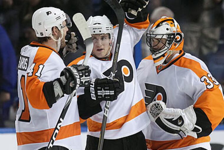 The Flyers now hold a five-point lead over Tampa Bay in the Eastern Conference standings. (Chris O'Meara/AP)