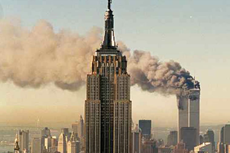 The twin towers of the World Trade Center burn in this file photo from Sept. 11, 2001. (Associated Press)