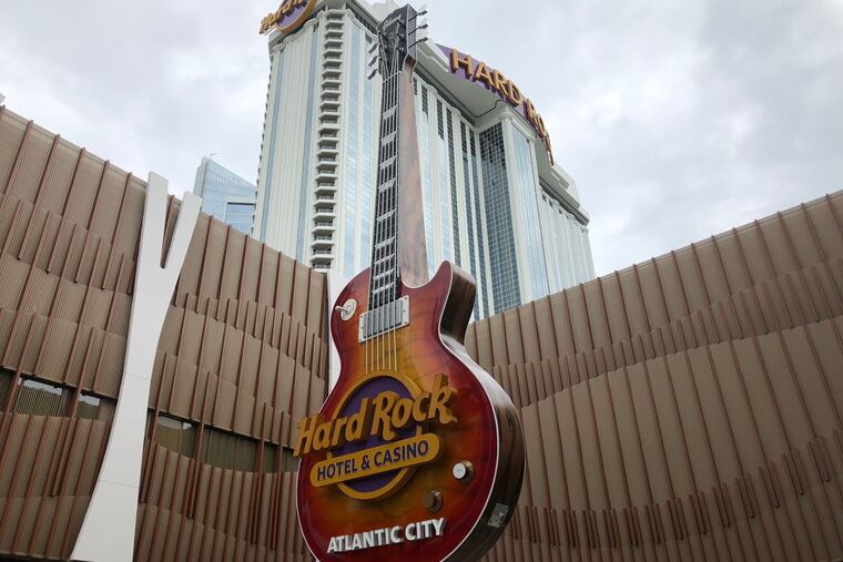 The Hard Rock Hotel & Casino on June 27, 2018, toward a planned June 28 opening. It is located on the site of the the former Taj Mahal, which closed in 2016 after a labor dispute with billionaire owner Carl Icahn. The now-president Trump hailed the business as the Eighth wonder of the world when it opened in 1990. Trump's name was removed from the property shortly after his 2017 inauguration, according to a court filing, because Icahn failed to maintain the iconic and invaluable Trump Entertainment brand.
