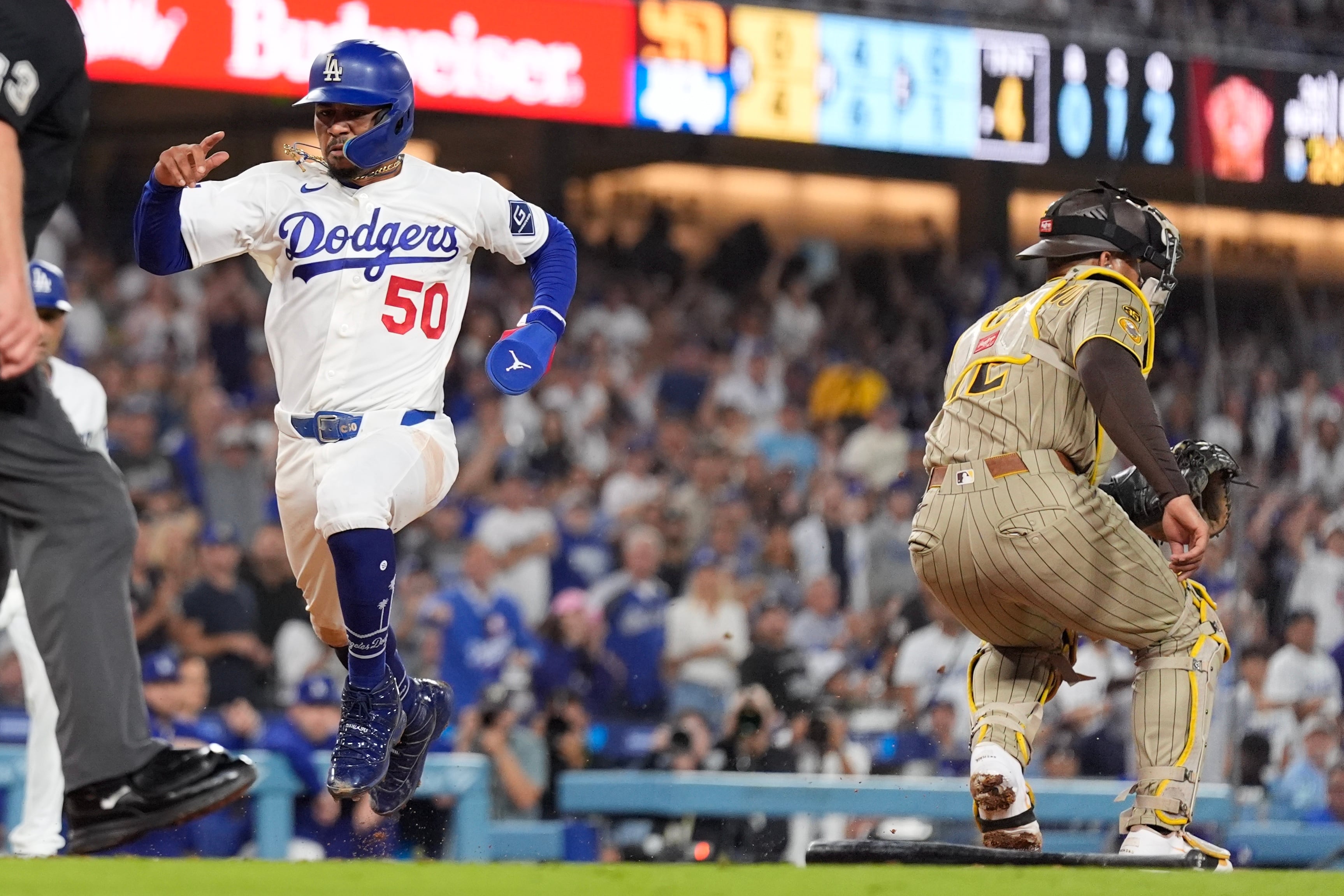 Dodgers score 5 two-out runs off Padres starter Michael King in 7-0 victory