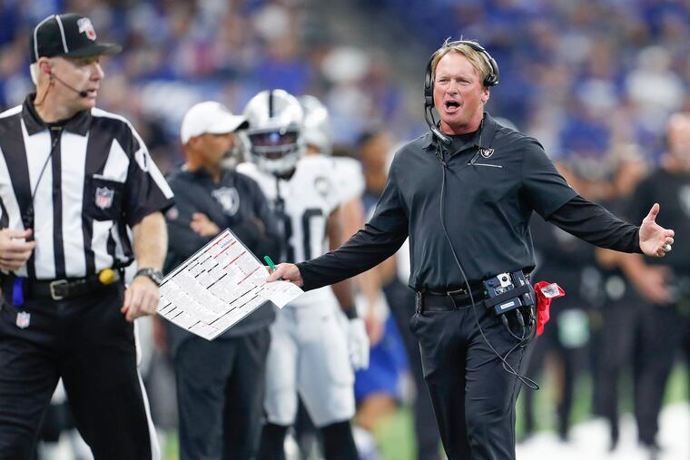 Raiders head coach Jon Gruden reacts to a second-half call in Sunday's game.
