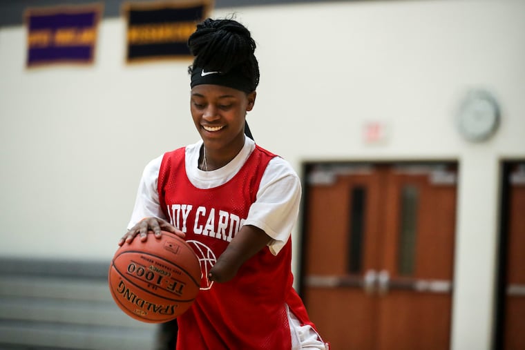 Berkley Harmon participates in drills during a tryout for the basketball team at the Upper Dublin High School Sports Complex in Fort Washington. Harmon is missing part of her left arm but is a multi-sport athlete.