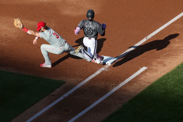 Phillies first baseman Bryce Harper makes the catch to retire the Mets' Harrison Bader during their game on Sept. 21.