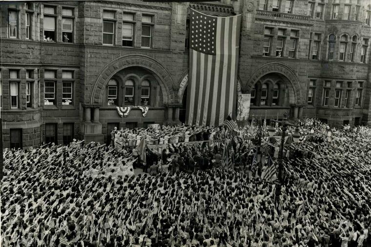 In exercises held in anticipation of 1942's Flag Day celebration, 12,000 students of six public high, junior, and elementary schools vowed their faithfulness to the American Flag at Benjamin Franklin High School at Broad and Green Streets. The flag, 18 by 33 feet, was made in 1909 and therefore contains only 46 stars.