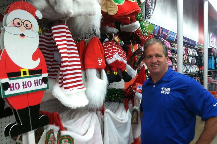 Joel D. Anderson , at a Five Below outlet on the 1500 block of Chestnut Street, looks for pride in the stores.