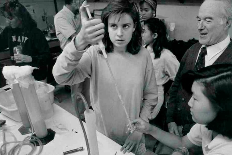 The Penn enzyme researcher - and prankster - working with Central High School students on a 1987 college-level project.