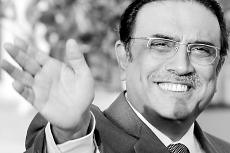 Pakistani President Asif Ali Zardari waved to media in Istanbul, Turkey, earlier this month. He was interviewed by Larry King recently about the Mumbai, India, attacks and catching Osama bin Laden.