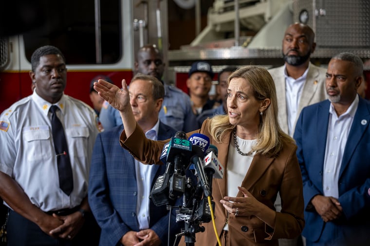 Gov. Mikie Sherrill answers questions from press in Camden, N.J.
