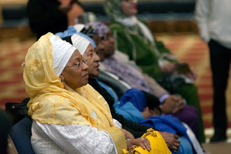The Islamic community joined clergy of several faiths and elected officials to denounce bus ads. (CHANDA JONES / STAFF PHOTOGRAPHER)