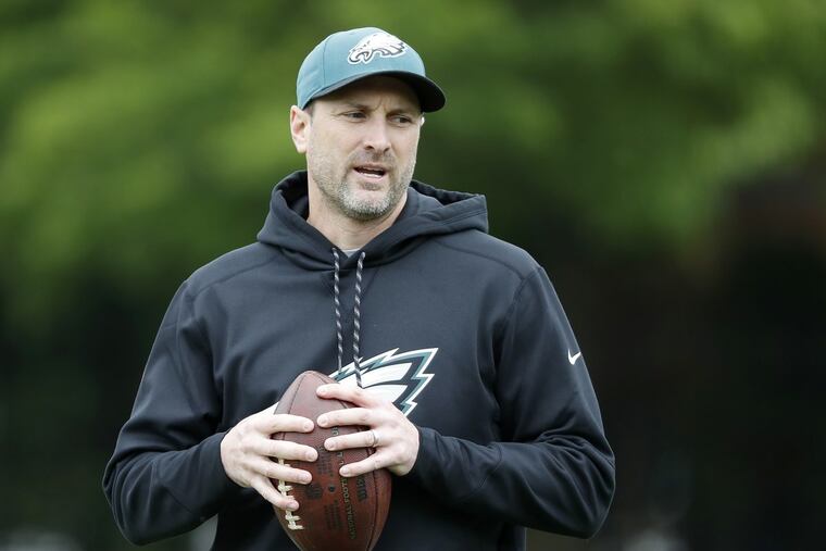 Mike Groh talking to players at Eagles rookie camp last year.