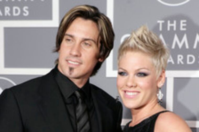 Motocross racer Carey Hart and Doylestown's Pink , at last year's Grammy Awards, have called it a marriage after two years.
