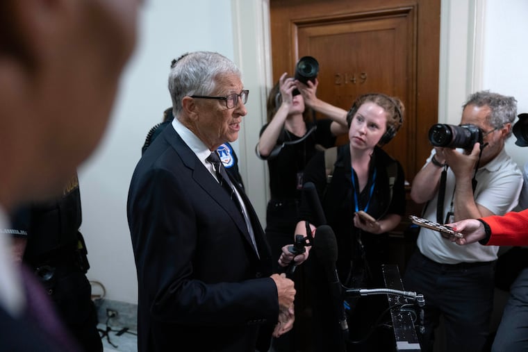 Bill Gates, cofounder of Microsoft, talks to reporters Wednesday as he arrives on Capitol Hill for a closed-door interview with the House Oversight Committee.