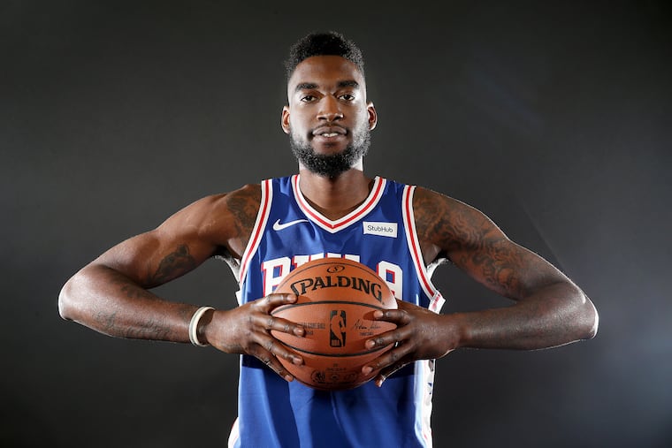 Center Norvel Pelle signed a two-way contract with the Sixers on Monday.