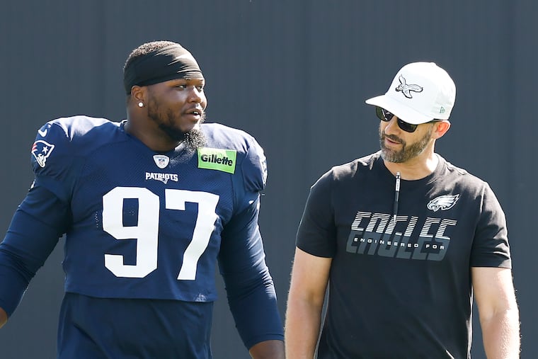 Eagles head coach Nick Sirianni with Patriots defensive tackle and former Eagle Milton Williams before a joint practice at Gillette Stadium on Wednesday.